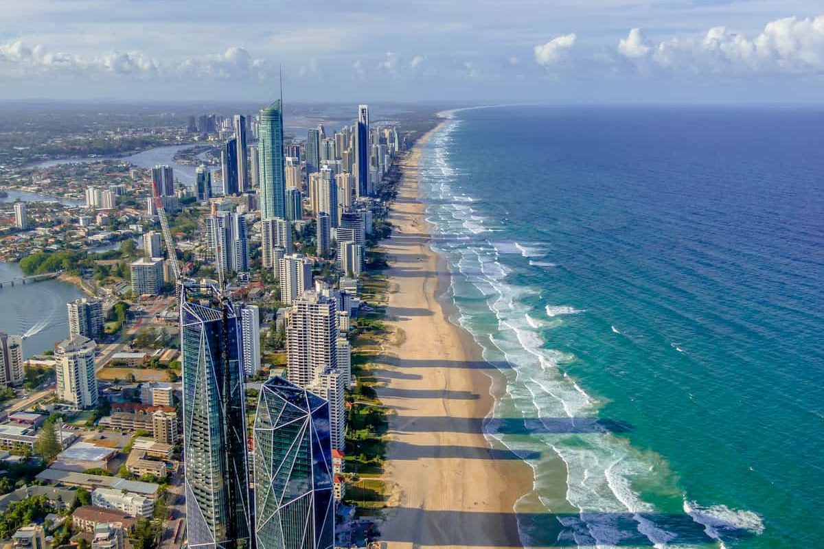 City skyline on the Gold Coast beach from an aerial shot by a drone above the buildings